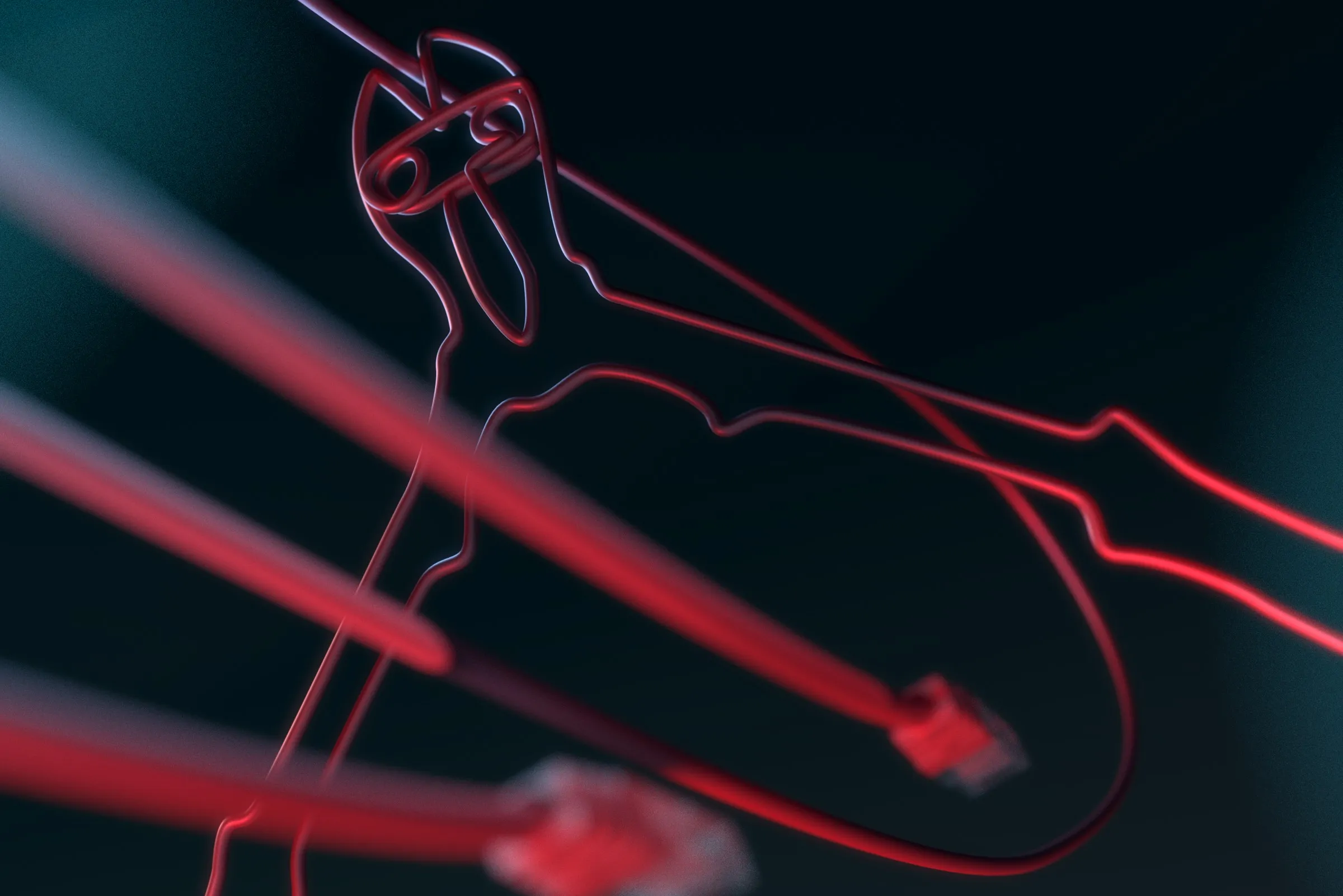 Glowing red network cables coiled into the silhouette of a pair of bolt cutters.