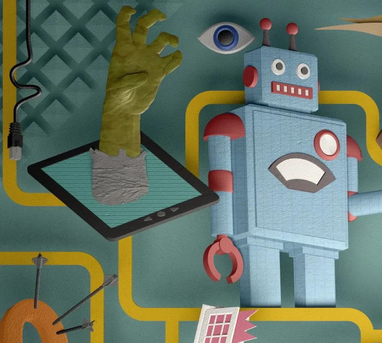 Detail of the papercraft artwork: a blue toy robot beside a green hand pushing up through the screen of a tablet.